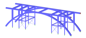 Engineer using structural analysis software integrated with BIM and CAD platforms on a computer workstation.