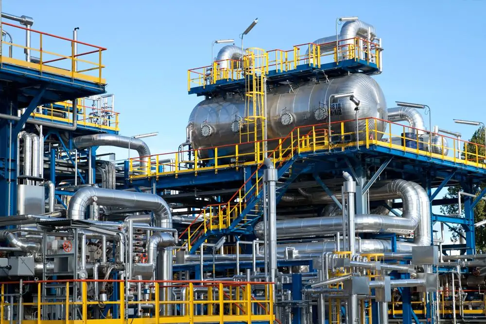 Industrial process equipment with pressure vessels, pipework and access platforms